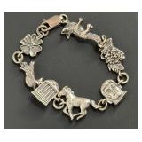 VINTAGE STERLING SILVER CHARM BRACELET