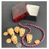 VINTAGE CARVED STONE SKULL NECKLACE