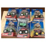 310 - SIX HOT WHEELS MONSTER CARS  (A63)