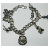 STERLING SILVER 7 INCH CHARM BRACELET 27.30GRS