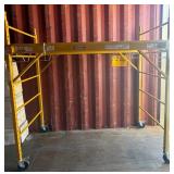 11 - WERNER YELLOW ROLLING UTILITY SCAFFOLD