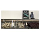 N2 - CLOTHES HANGERS, STEAM IRON, PUTTING MAT