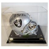 J2 - NFL RAIDERS SIGNED HELMET (F195)