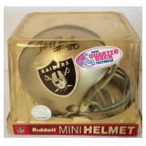 J2 - NFL RAIDERS MINI HELMET SIGNED (F216)