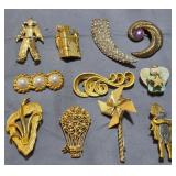 J4 - ASSORTED GOLD TONE BROOCHES AND PINS