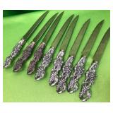 11 - SET OF ORNATE KNIVES (Z86)