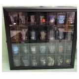 11 - COLLECTION OF SHOT GLASSES IN DISPLAY (C40)