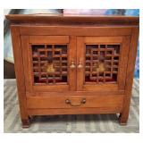 11 - TWO-DOOR WOODEN CABINET W/ CUSHIONS (F30)