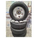 11 - SET OF FOUR RIMS WITH TIRES