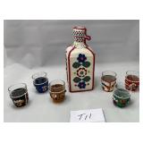 513 - VTG FOLK ART LEATHER WRAPPED DECANTER SET