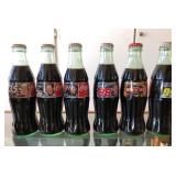 S3 - SIX COLLECTIBLE COCA-COLA BOTTLES (B214)