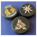 S3 - THREE COLLECTIBLE NHL HOCKEY PUCKS (B2)