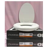 11 - TWO SOFT TOILET SEATS NEW IN BOXES (D47)