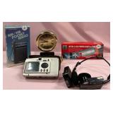 11 - RADIO, CAMERA, CLOCK, POWER LIGHT, HEADPHONES