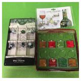 TWO SETS OF WINE CHARMS