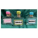 43 - NEW WMC LOT OF THREE BOTTLE DECANTERS