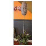 S2 - FACE SCULPTURE ON STAND W/ FAUX PLANT (E44)