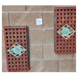 S2 - TWO RED METAL LATTICE PANELS W/ FLORAL TILES