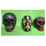 548 - THREE DECORATIVE SKULLS (A12)