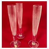 513 - THREE CLEAR GLASS BUD VASES (T106)