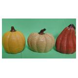 548 - THREE DECORATIVE CERAMIC PUMPKINS(A85)