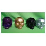 548 - FOUR SKULL VOTIVE HOLDERS (A5)