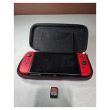 Nintendo Switch w/ Mario Cart Deluxe 8 works well
