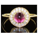 Cabochon Ruby & White Topaz Halo Ring
