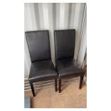 2 leather like dining chairs (sc9)