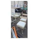 Glass table and two chairs