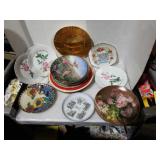 Stack of assorted vintage designer plates