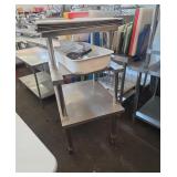 Unique stainless steel table on wheels