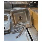 Hand sink with tap