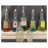 Lot of 7 Glass Barber Bottles