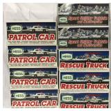 13 Boxed 1990s Hess Trucks