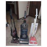 Three Upright Vacuum Cleaners