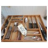 Wooden trays with flatware