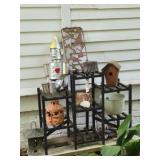 Plant stand with contents