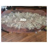 Oval carved coffee table