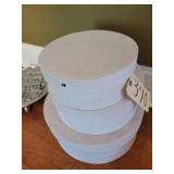 3 white hat boxes