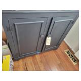 Black cabinet (37' h, 15' d, 36' w)