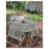 Rod iron table, 4 chairs, lounge chair
