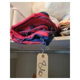 Garmet travel bag with assortment of fabric,
