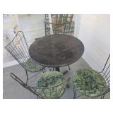 Patio table w/ 4  iron chairs
