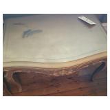 2  gold colored painted antique tables