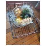 Decorative balls in copper handle baskets