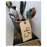 Pottery utensil holder
