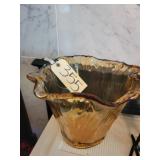 Ruffled amber colored vase