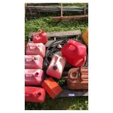 Pallet of 9 gas tanks and hoses