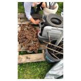 Pallet with chains, set of wheels and tires, and